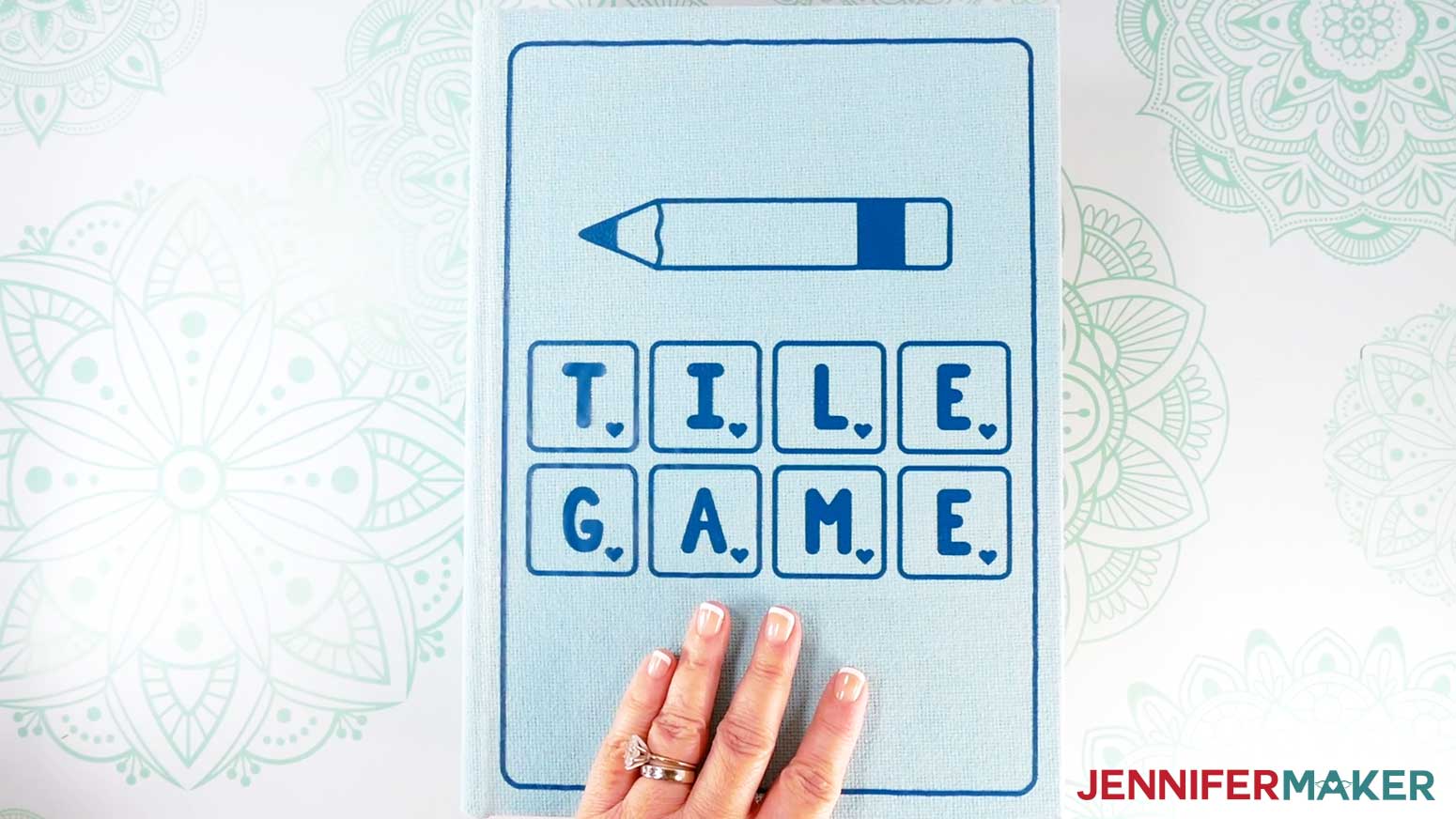 Finished Tile Game DIY board game box showing a blue painted cover with blue vinyl