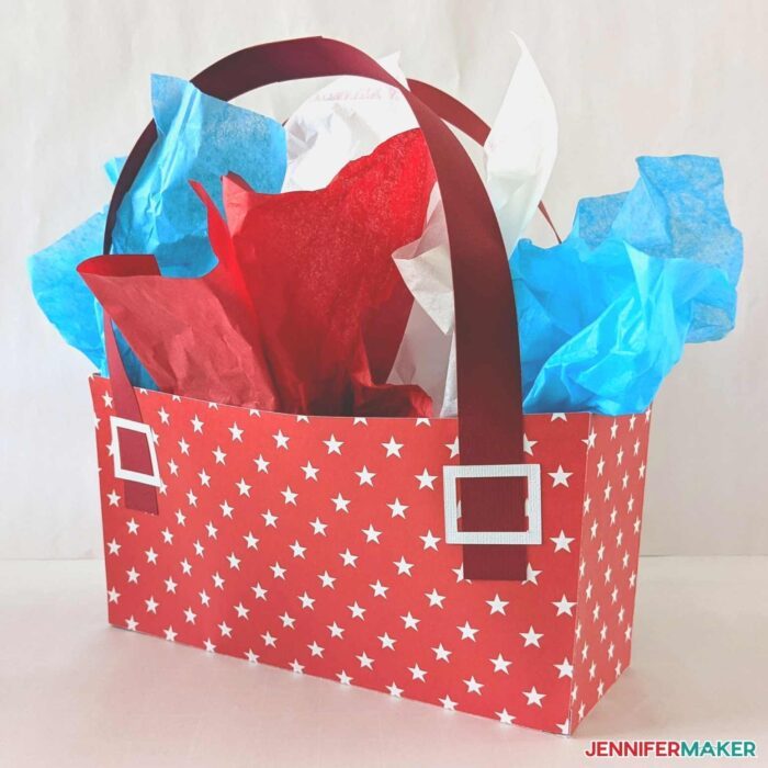 Red and white Cardstock DIY Gift Bag with tissue paper.