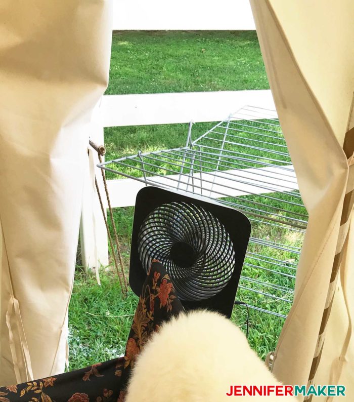 A fan in front of an open door can really cool off a glamping pavilion