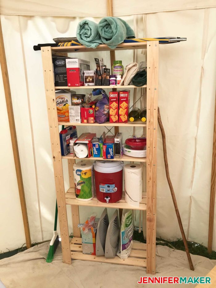 A simple wooden shelf makes a great DIY glamping idea for storage