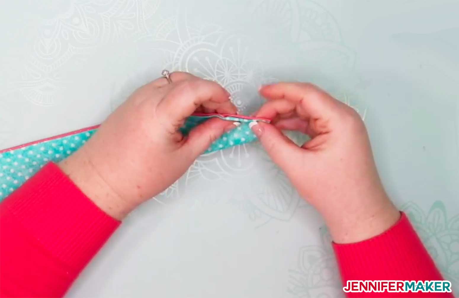 Tuck in the ends of your DIY headband with buttons