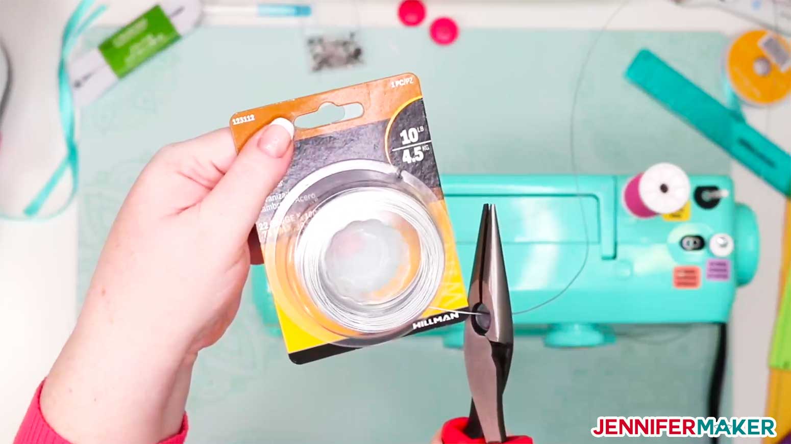 Cutting a piece of wire for the Tie-style headband with buttons