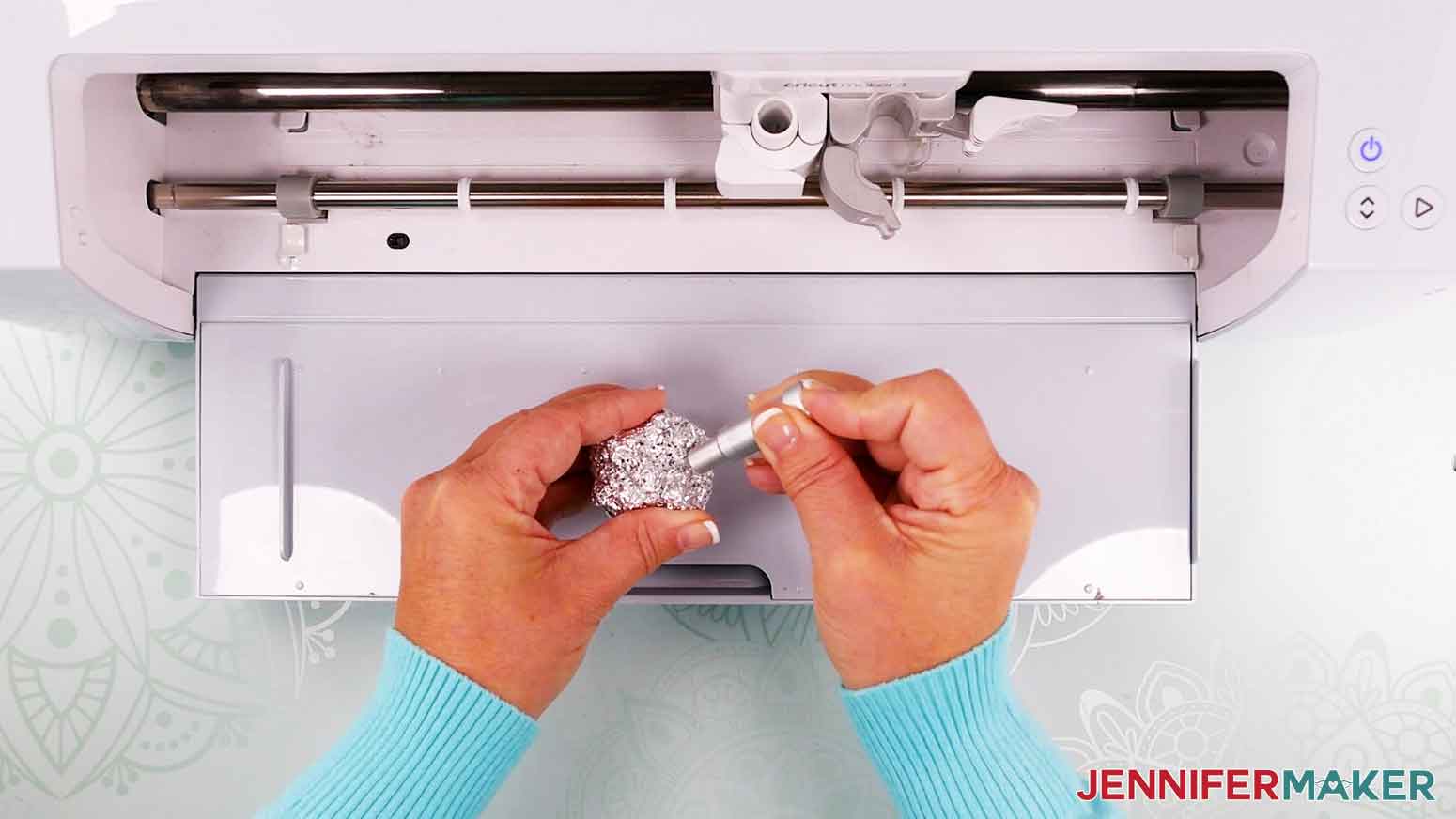 Use an aluminum foil ball to poke fine-tip blade in to clean any cutting debris.