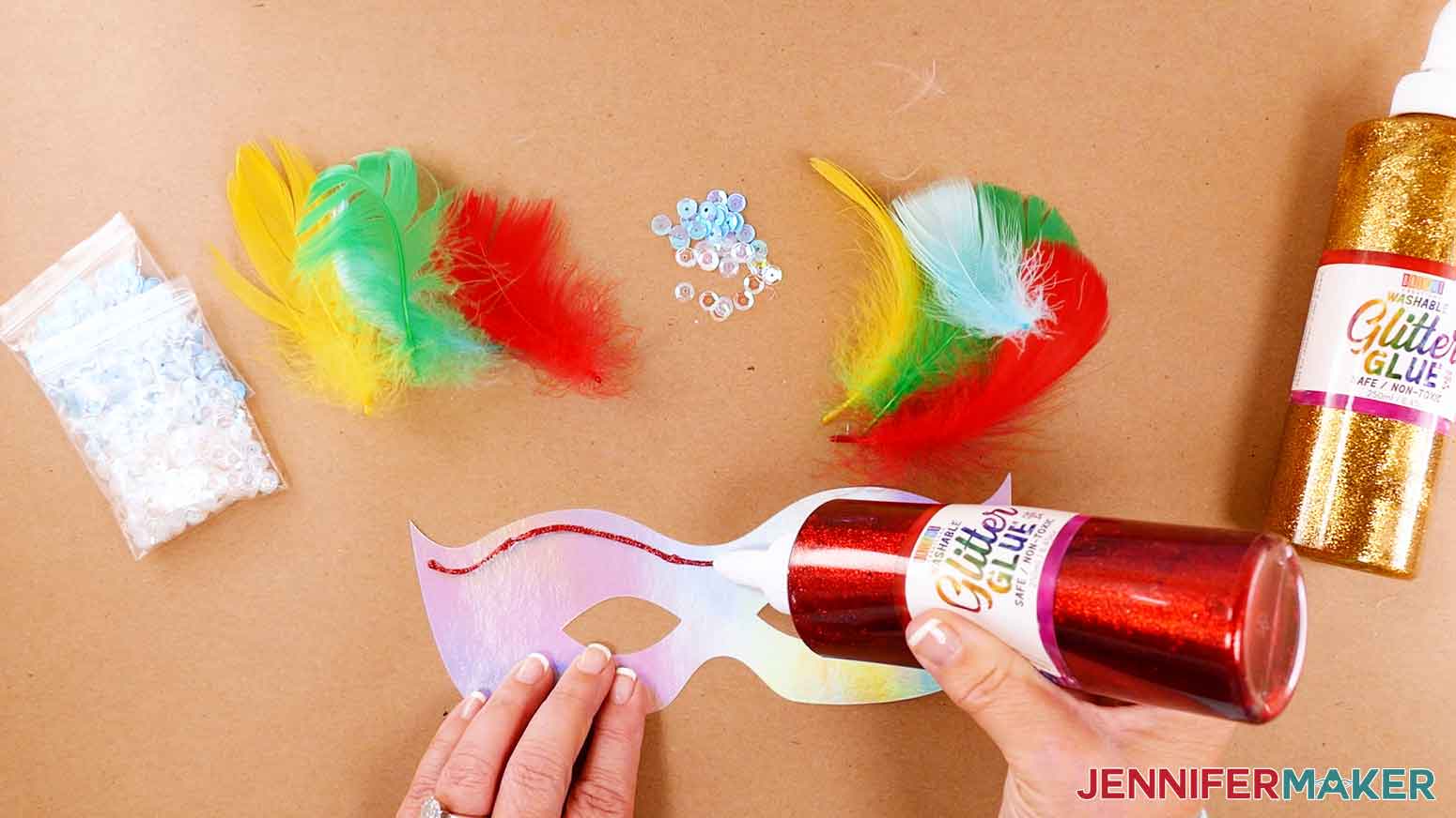 Apply glitter glue to DIY masquerade mask for a personalized design.