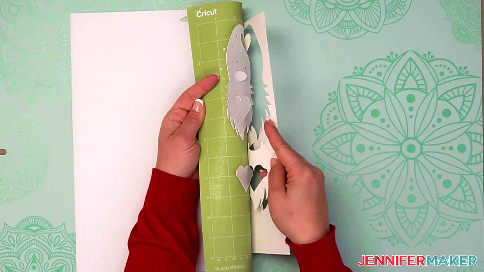 Flip cutting mat and gently peel mat away from the cardstock to prevent curling.
