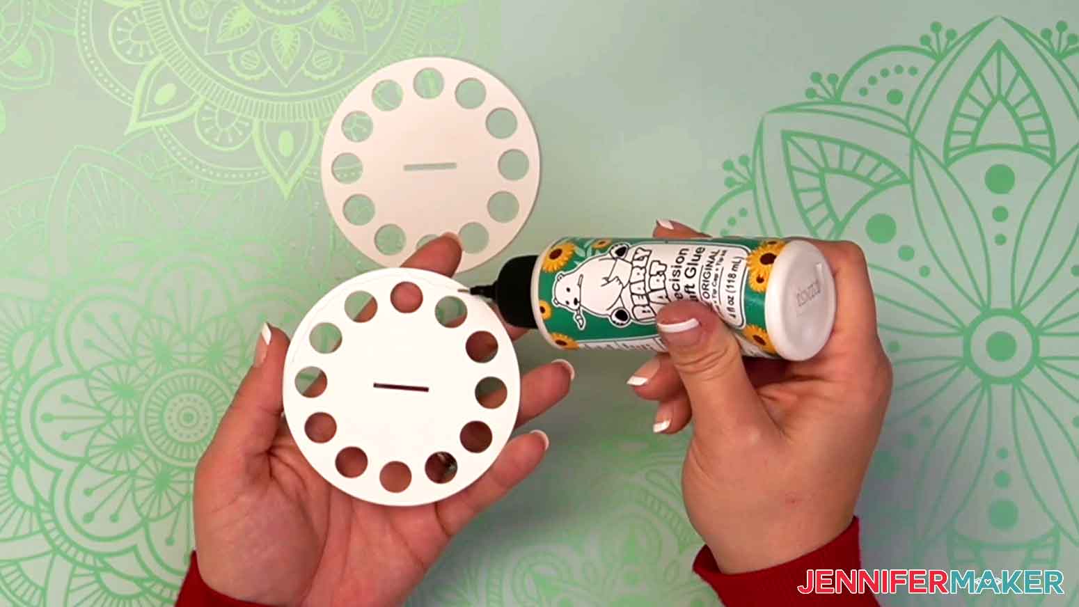 Apply small dots of craft glue around first tier and glue three layers together with the holes aligned.