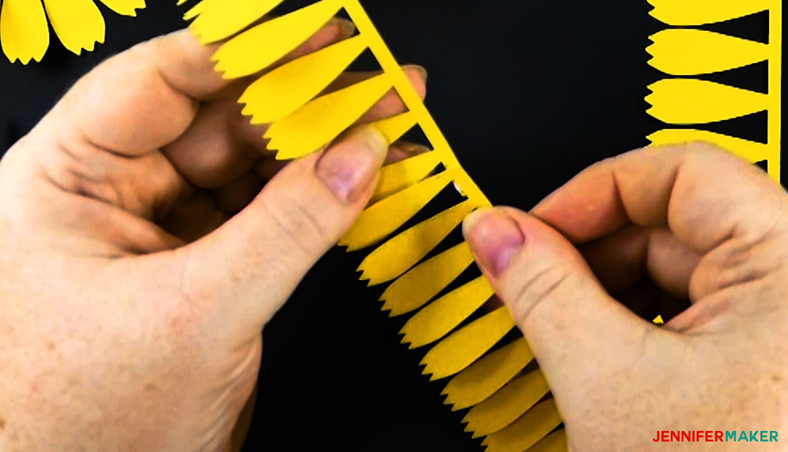 Glue the strips together end to end for the DIY paper marigold