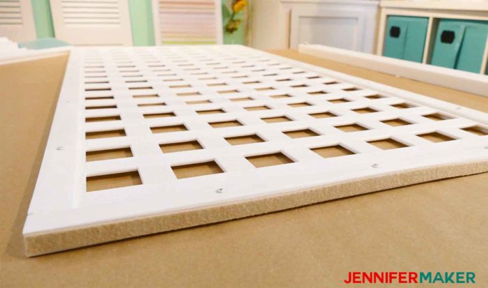 Stick felt pads to the bottom of your DIY pet / baby gate panels to protect your floors