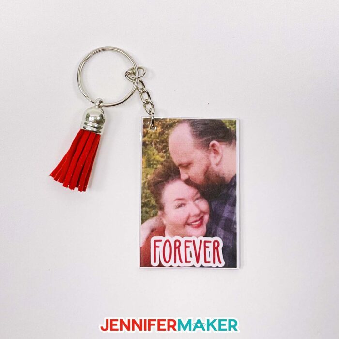 Rectangle DIY photo keychain with an image of a happy couple and the word forever.