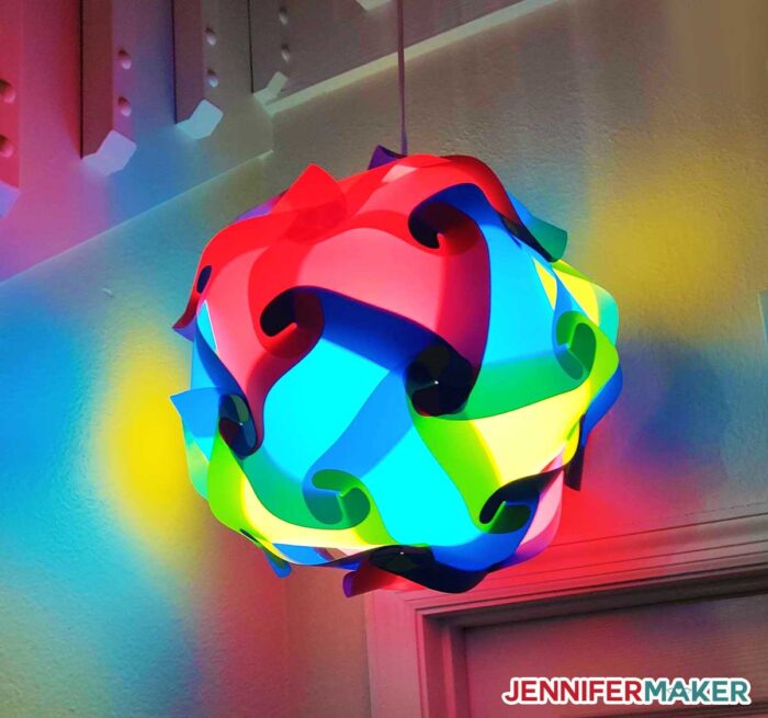 DIY Puzzle Lamp in multiple colors hanging from a ceiling