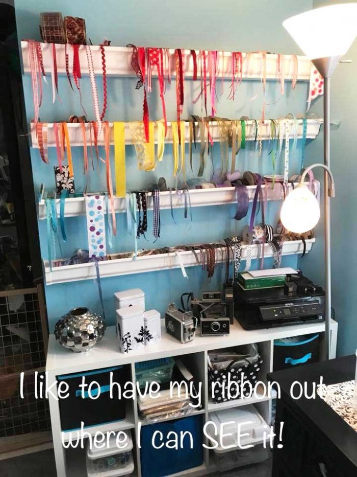 DIY ribbon holder made from stir sticks and dollar tree supplies