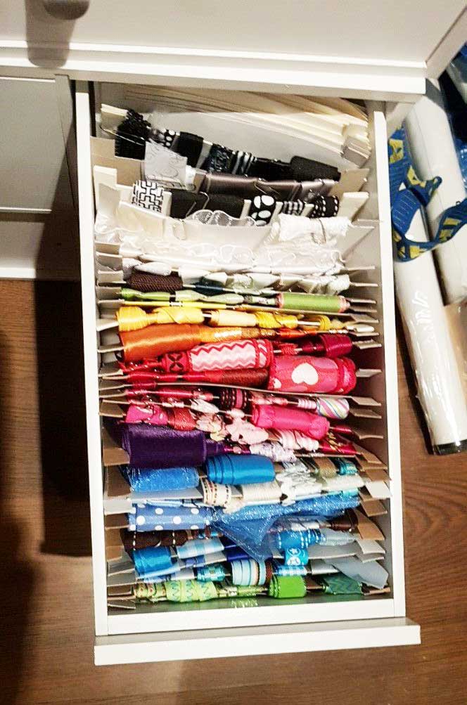 Ribbon wrapped around cardboard and filed in a drawer makes great ribbon storage!