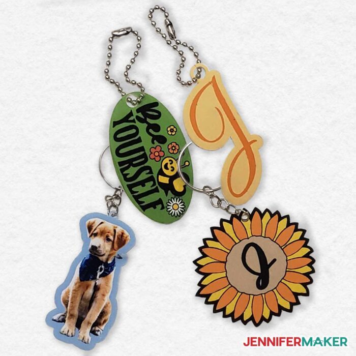 Keychains with initials, photos, and illustrated designs made using DIY shrinky dinks.