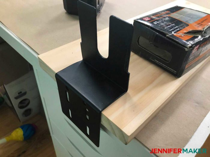 Attaching a rotisserie turner to a board to make a DIY tumbler turner