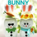 Handmade light-up Easter Bunny made from glass vases from the dollar store. Make JenniferMaker's cute Dollar Tree Bunny project for Easter!