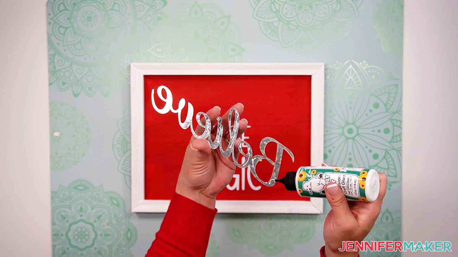 Use Bearly Art Precision Craft Glue to apply metal accent word to canvas.