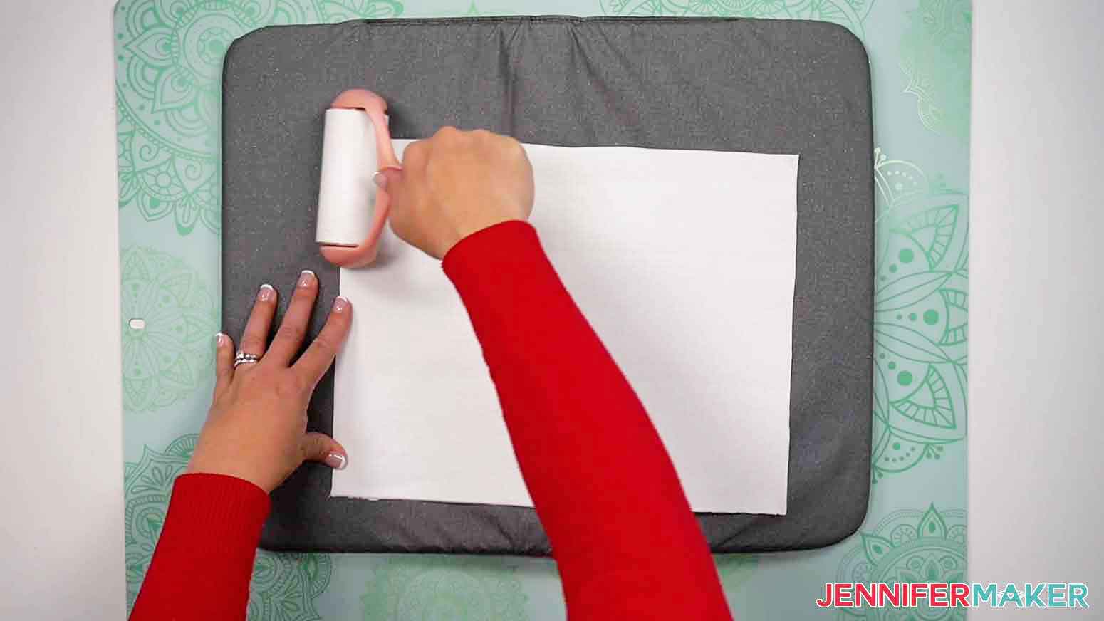 Use a lint roller to clean the canvas of any debris before applying design.
