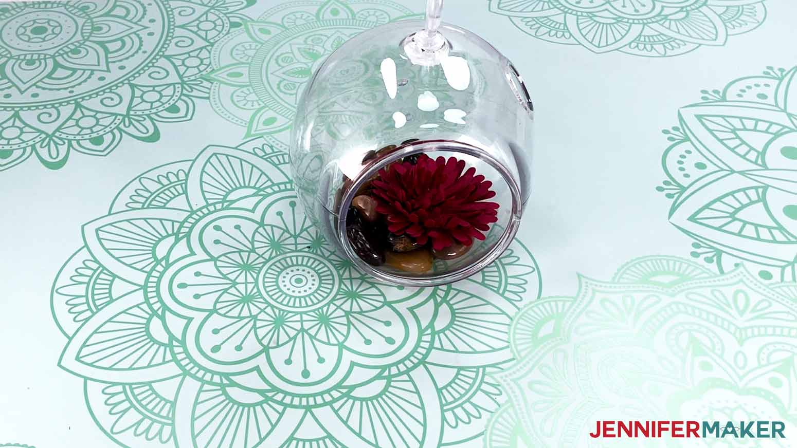Dollar Tree Cricut Projects showing finished globe terrarium with red succulent.