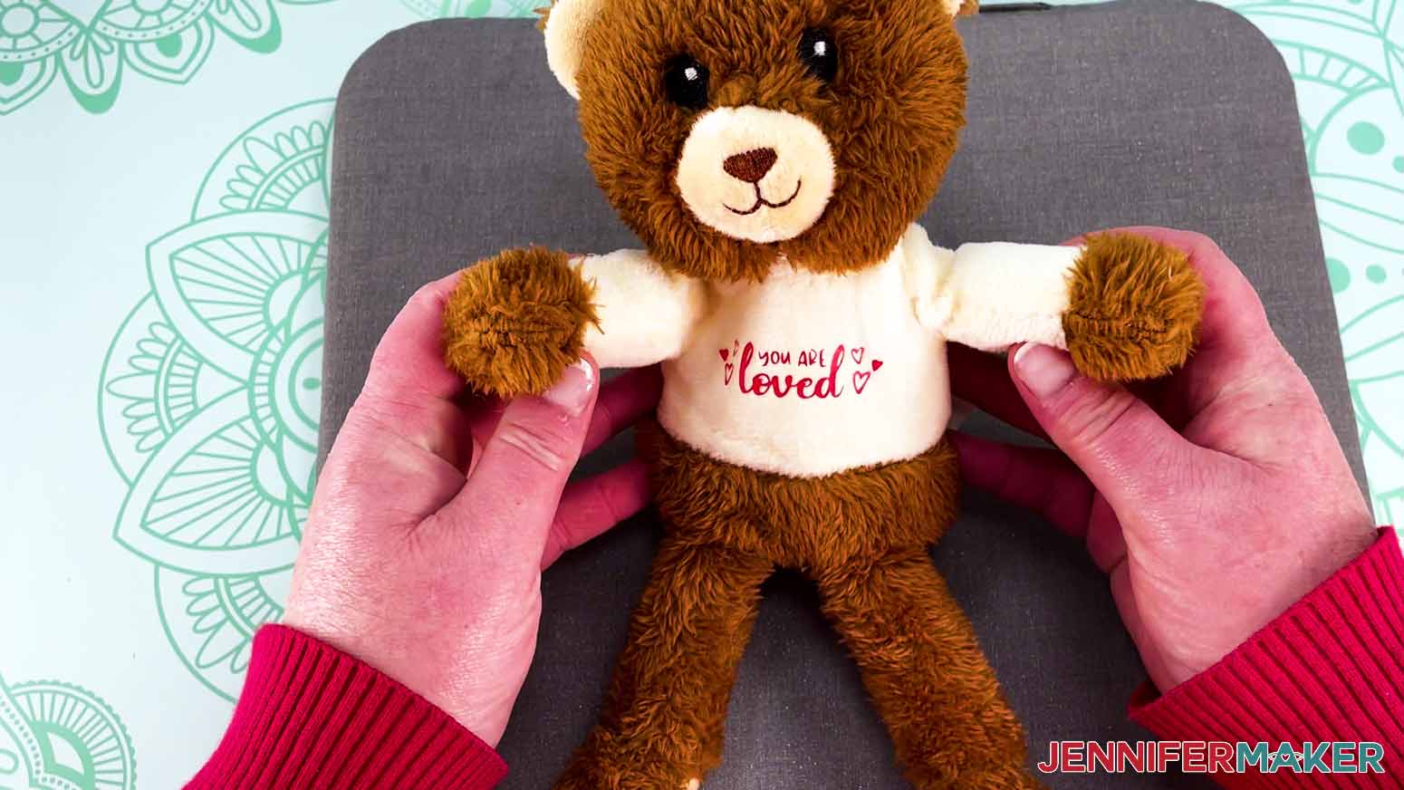 Dollar Tree Cricut Projects finished plush bear on display by crafter.