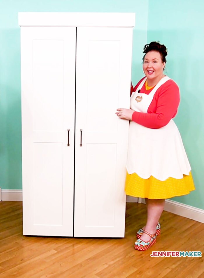 Jennifer and her white DreamBox craft storage armoire