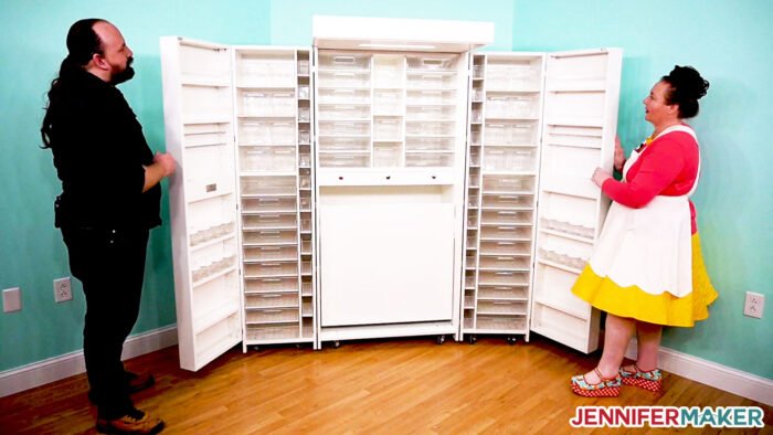 Jennifer opening her white DreamBox craft storage armoire