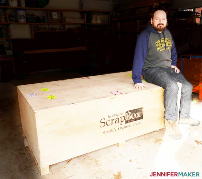 Greg sitting on a DreamBox shipping crate on the day it arrived