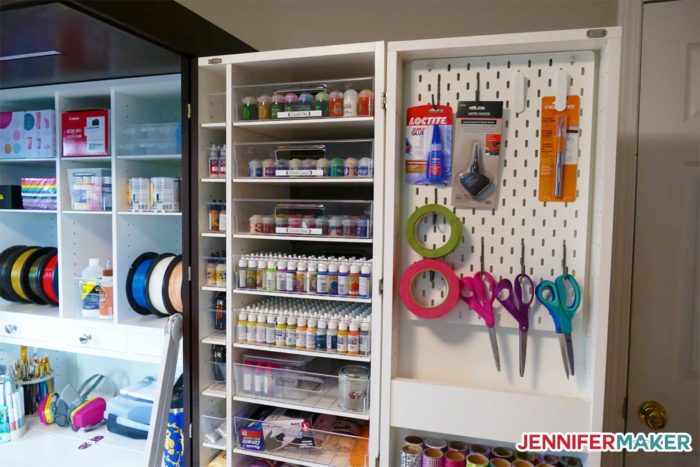 DreamBox side door filled with craft supplies and an IKEA pegboard