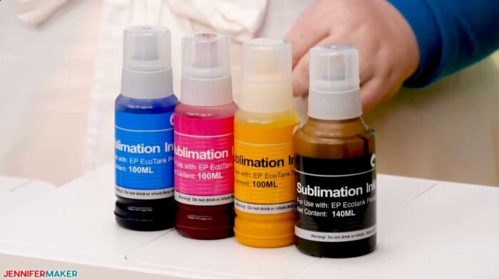 Sublimation Ink bottles in cyan, magenta, yellow, and black