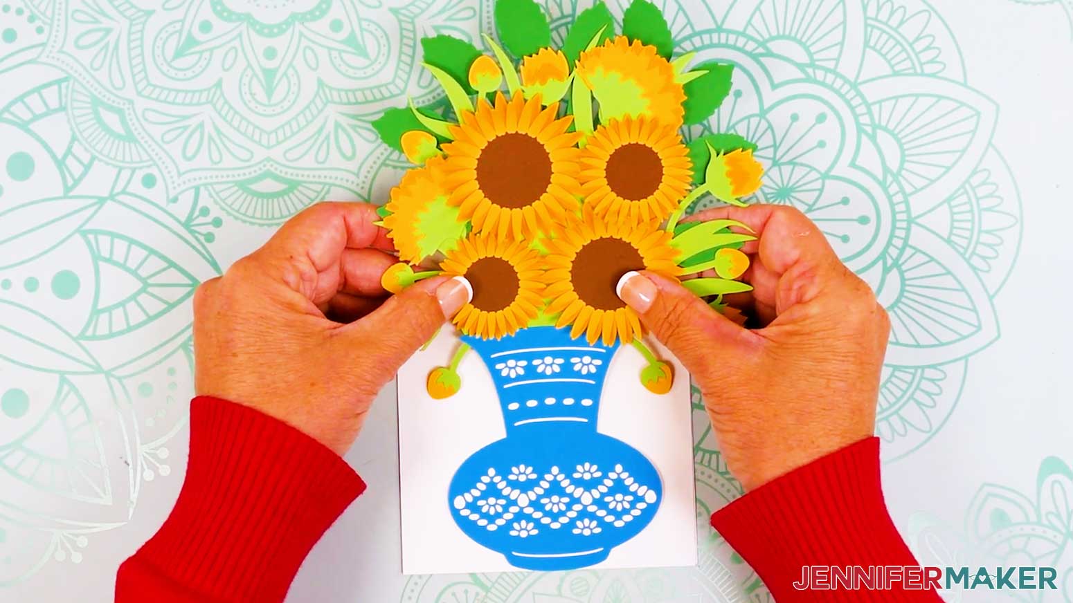 The vase has been applied to the center of the card with the bottom of the vase close to the bottom edge of the card.