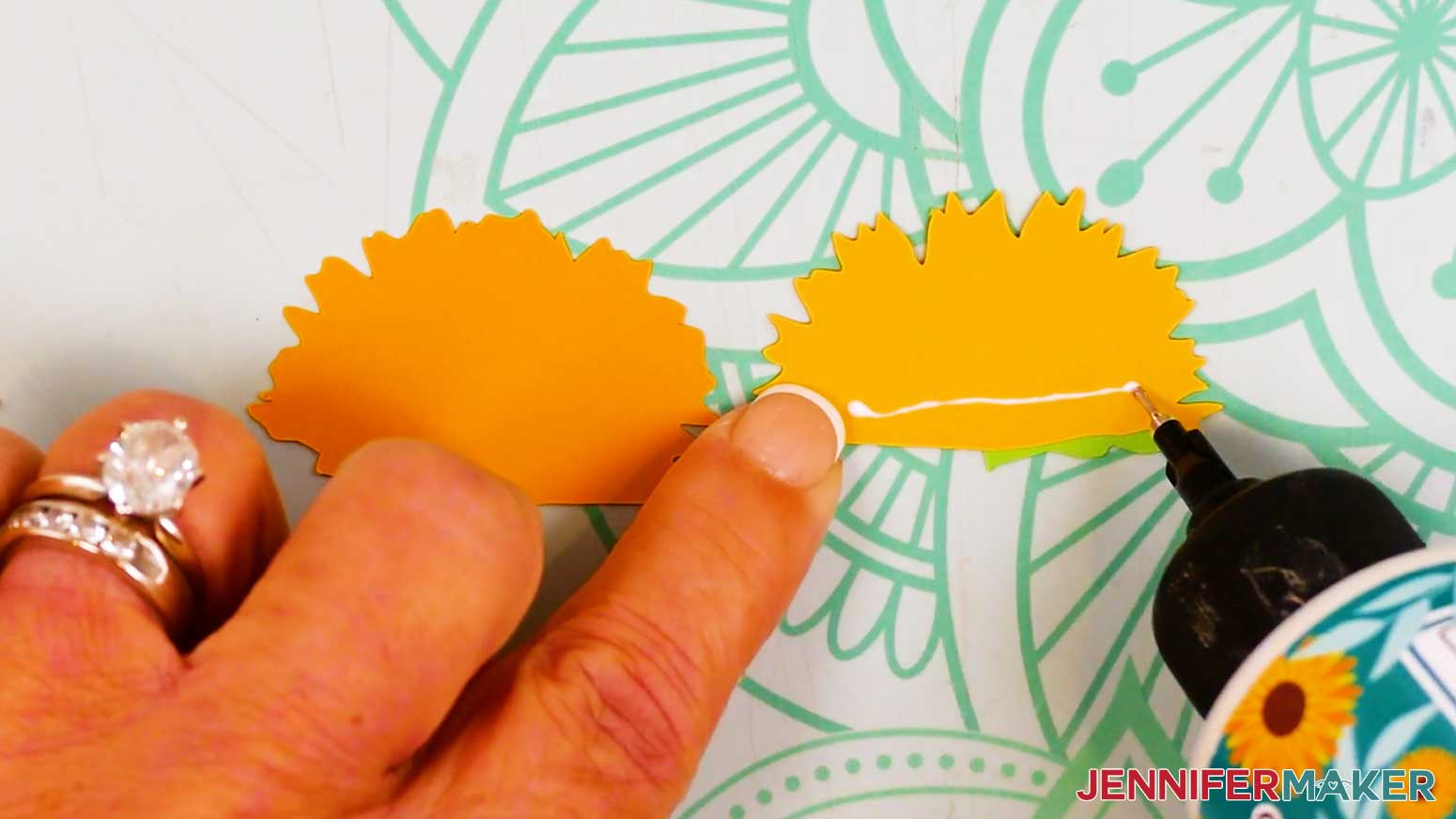 The orange and yellow petal layers are shown with glue on the back of the front yellow petal layer.