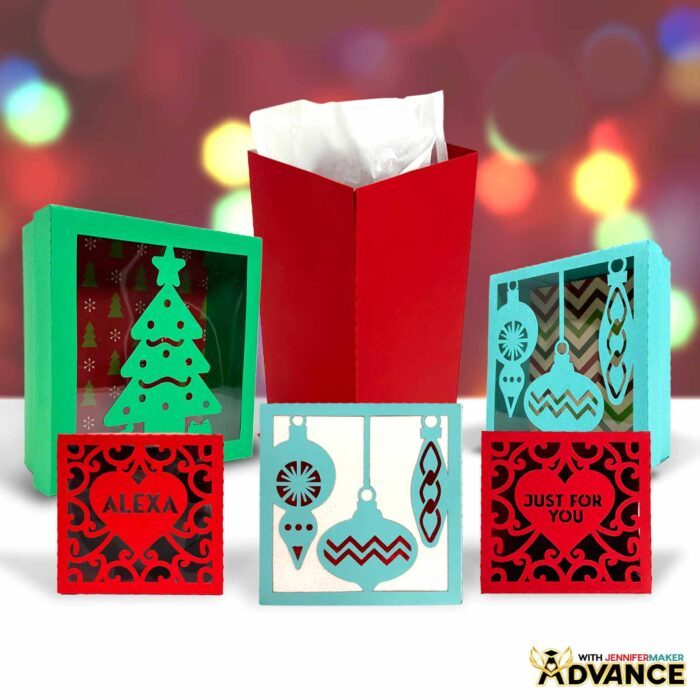 Easy DIY Gift Boxes cut from cardstock for the holidays, with personalized details, against a twinkle light backdrop