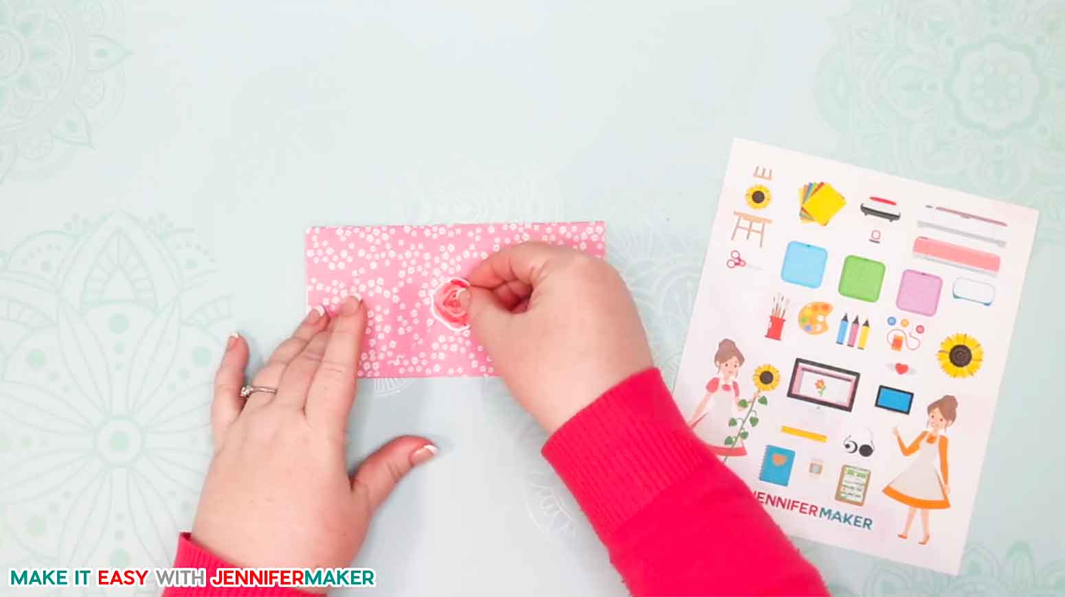 Placing a sticker on the easy heart envelope card to keep it closed