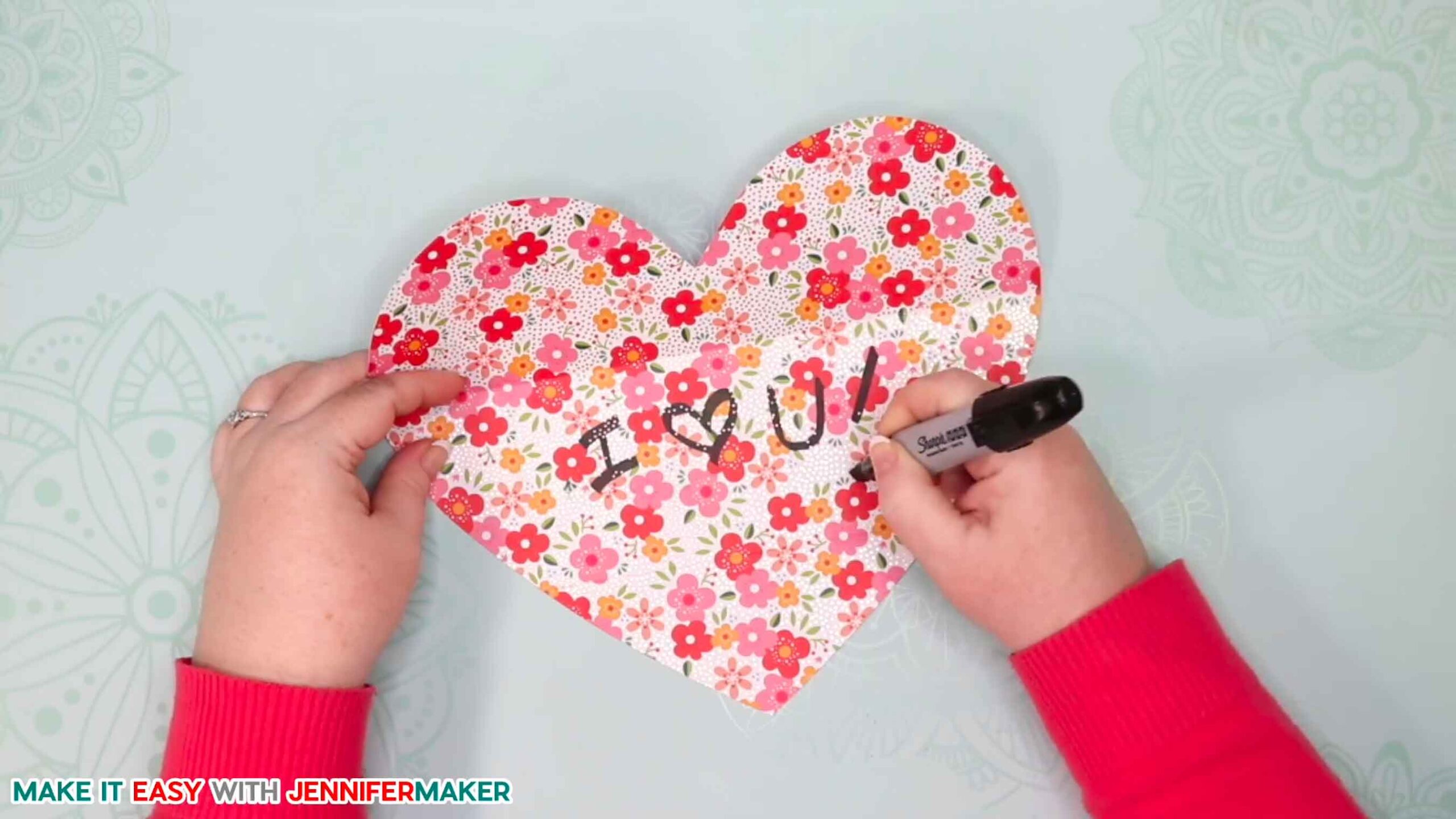Writing a message in your easy paper heart envelope card