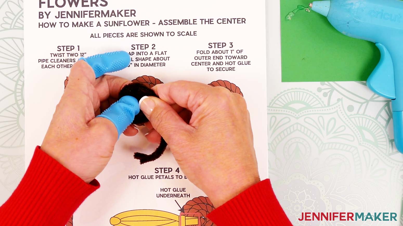 Starting at one end of the twisted brown pipe cleaners, coil them into a flat spiral.