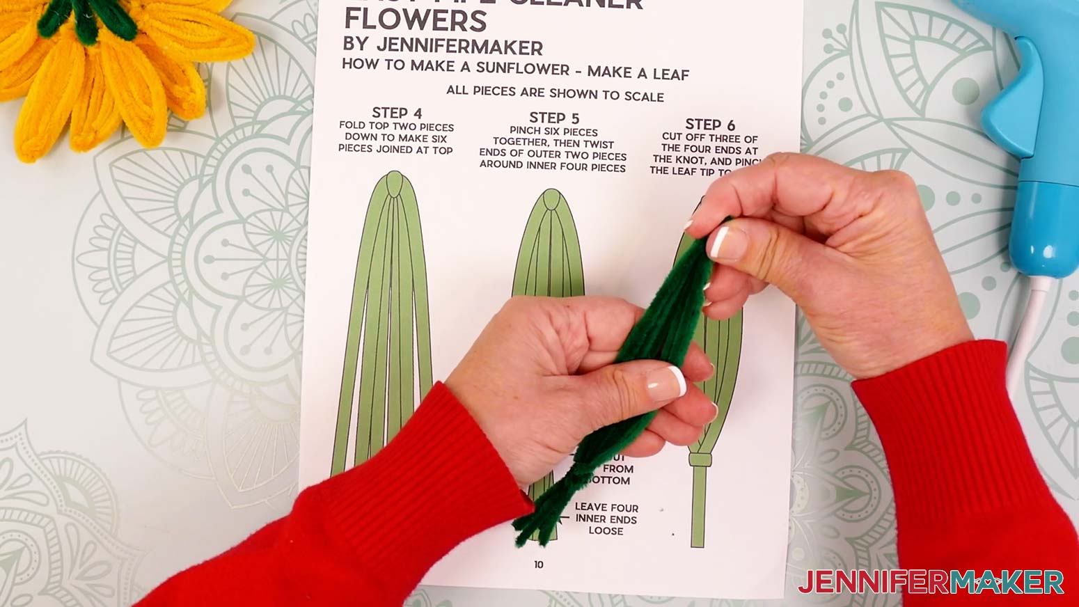 Shape the pipe cleaner leaf by pinching the top joint.