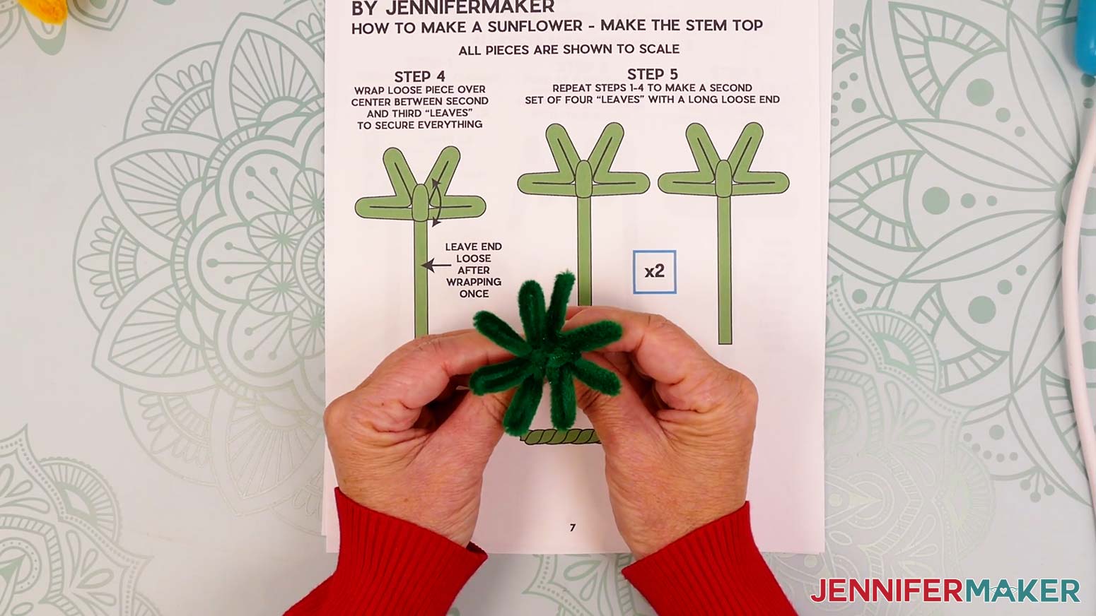 Fold the two halves of the stem top down to make a flat surface with eight leaves.