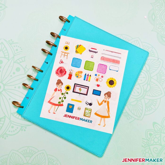 JenniferMaker print then cut stickers of Cricut icons on a blue binder