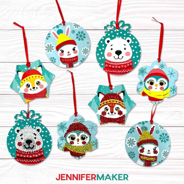 Collection of sublimated ornaments with brightly colored animal illustration designs. Half of the ornaments have gems attached for an Embellished Ornament look