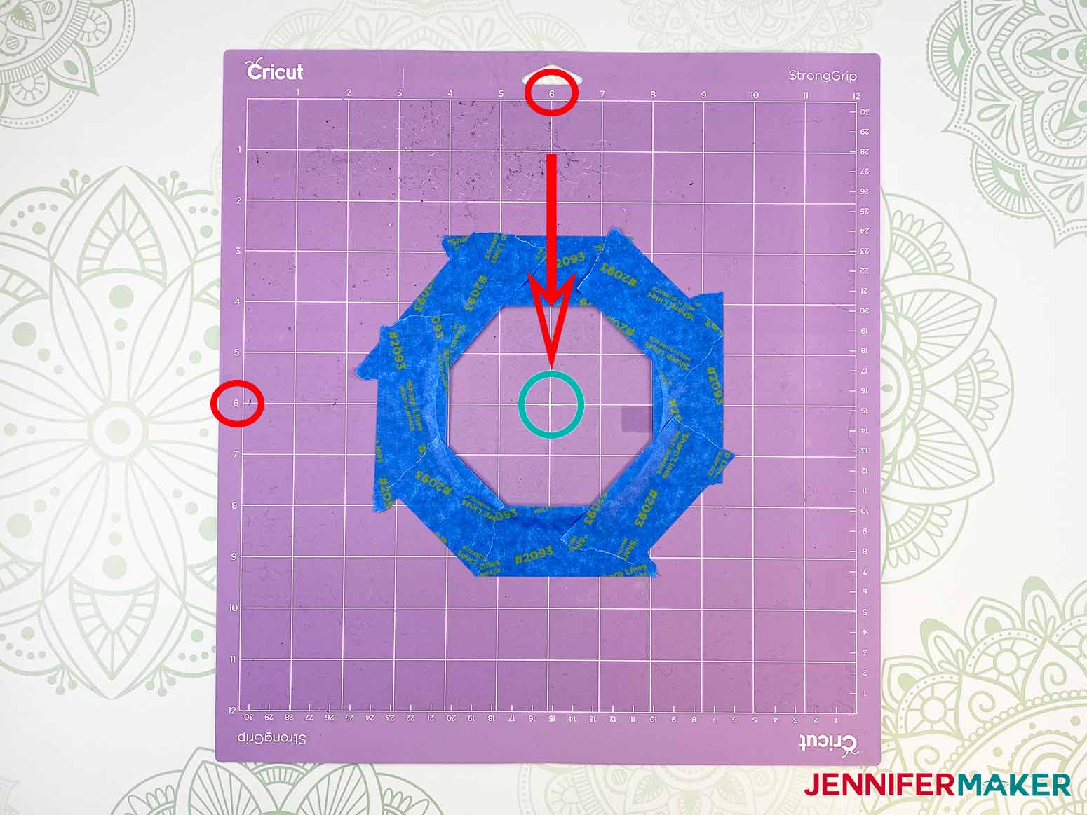 Center and tape all edges of the acrylic disk to the Cricut strong grip mat to make my engraved acrylic project