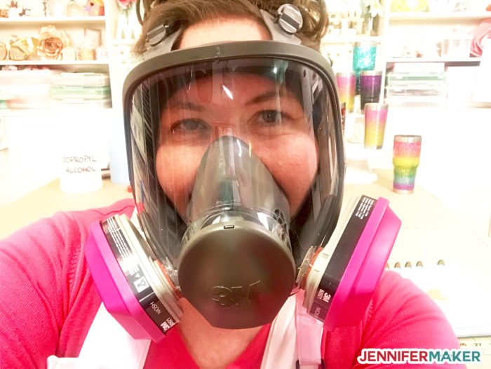 Jennifer Maker in her full face respirator with organic vapor filter cartridges practicing her epoxy safety tips