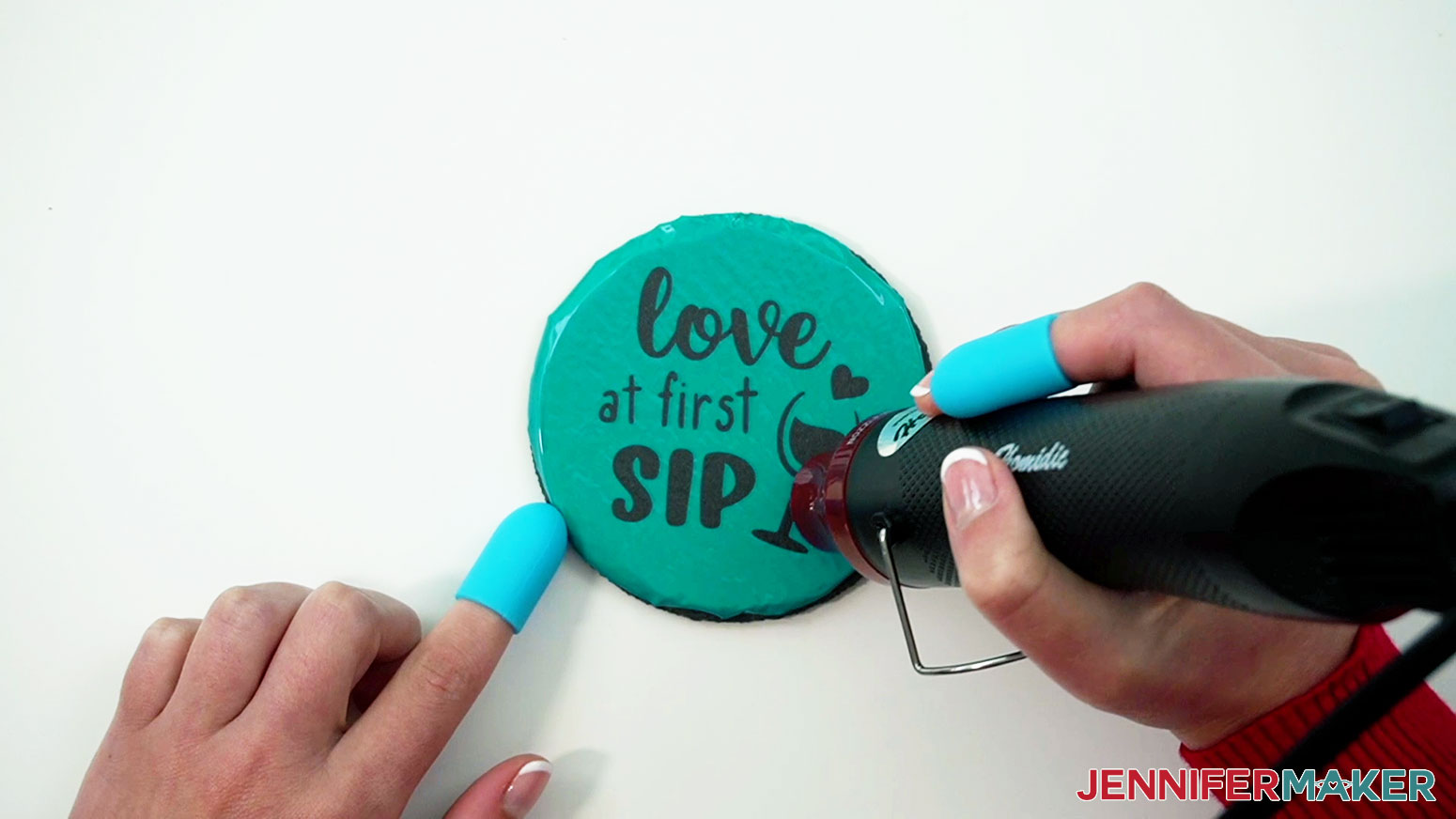 Use a heat gun on the vinyl stencil to help adhere it to the slate coaster before etching.