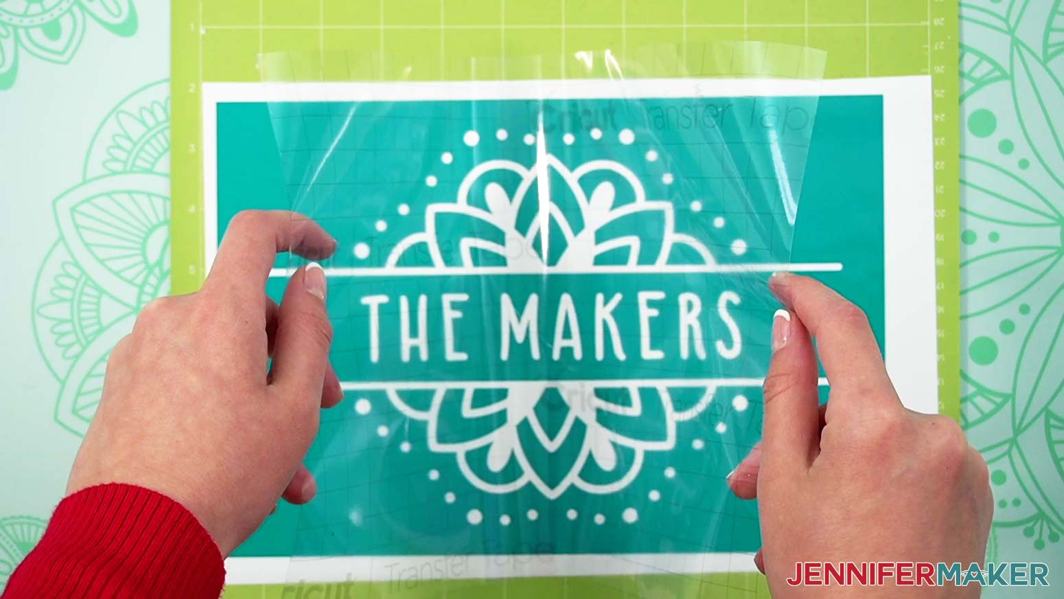 Use the taco method to apply StandardGrip transfer tape to the slate cheeseboard's permanent vinyl design.