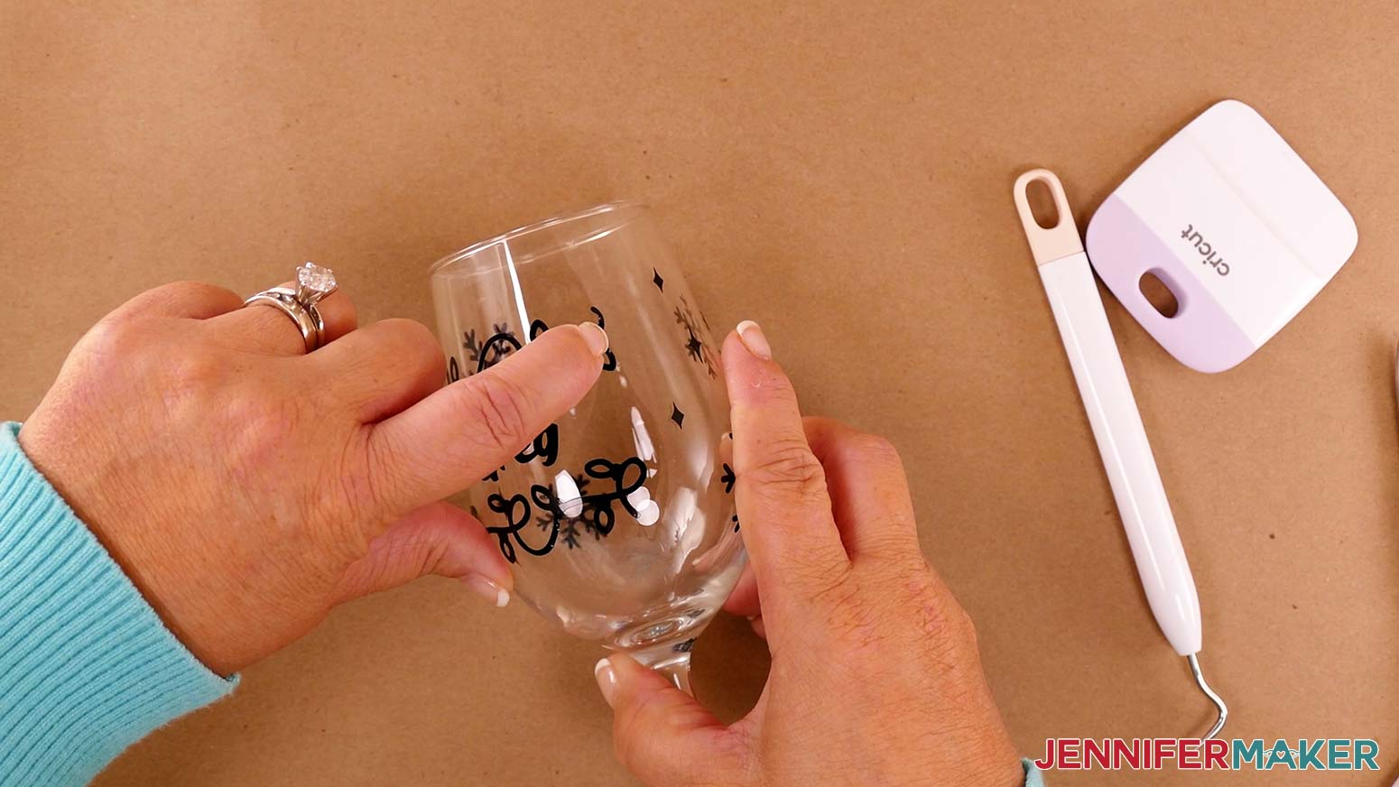 Press the vinyl stencil onto your wine glass really well with your fingers before applying etching cream to prevent the cream from seeping underneath. If you're not wearing gloves, be sure to clean your glass with rubbing alcohol after you're done.