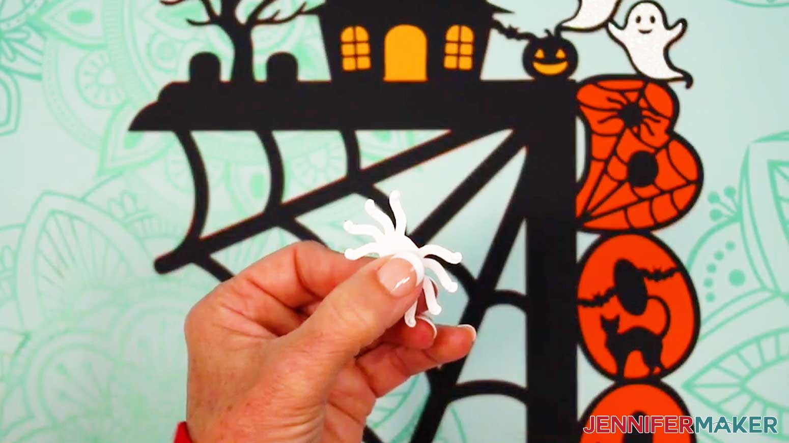 Add small dots of craft glue to the tips of the spider legs.