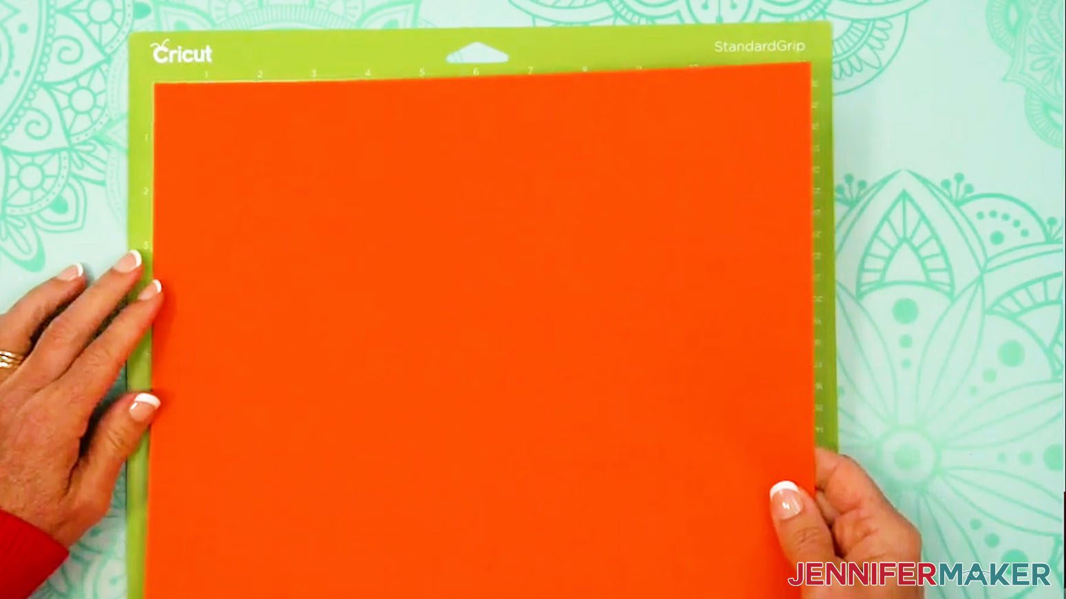 Place the cardstock for the Fall Tea Light Holder onto a green StandardGrip Machine Mat