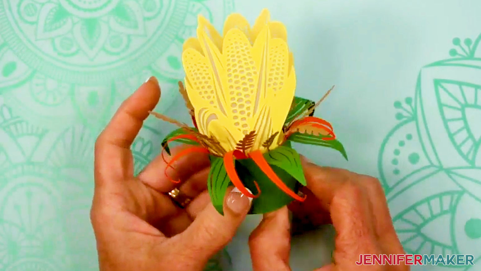 Insert the layers of the Corn Fall Tea Light Holder into the outer ring.