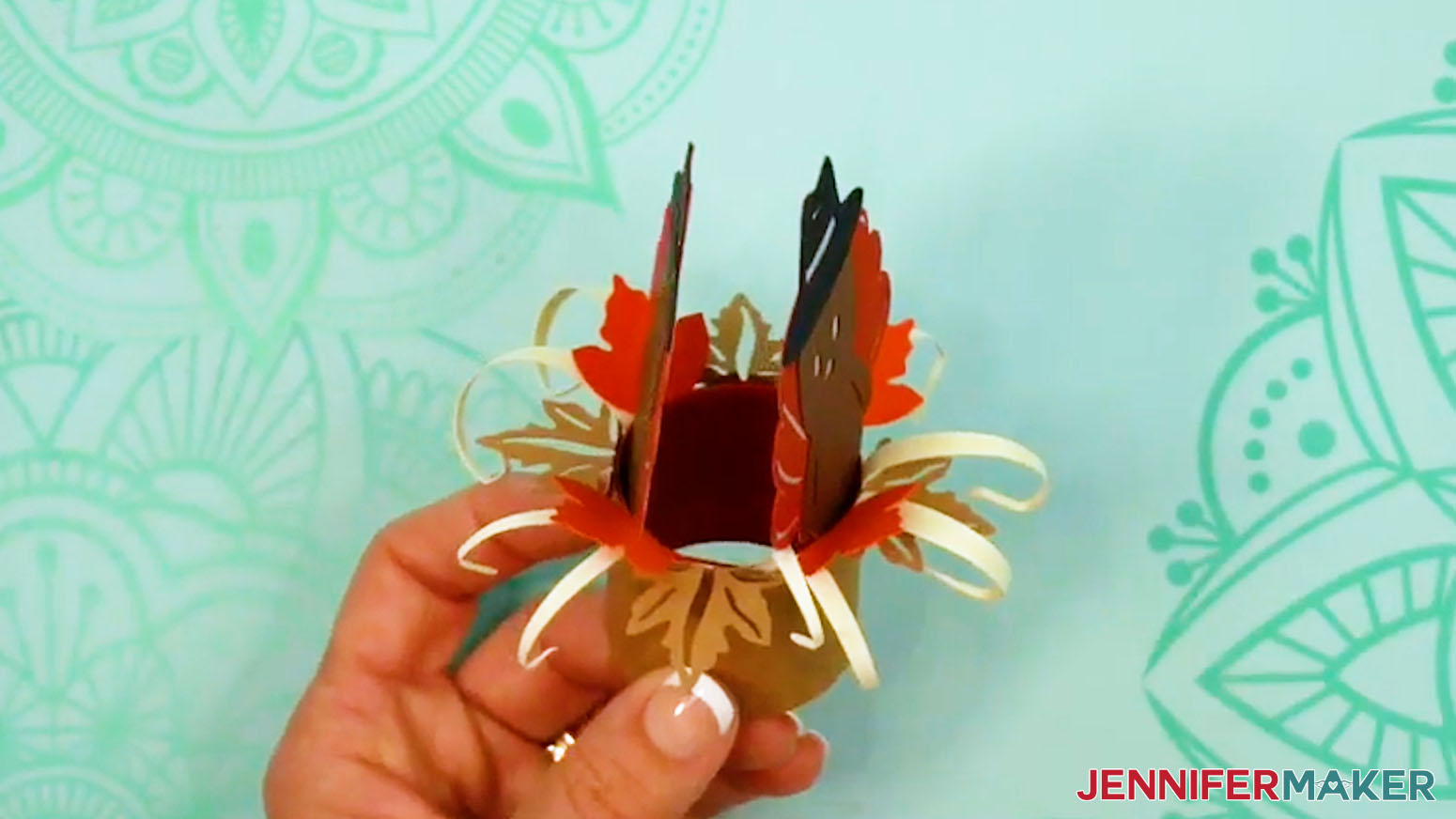 All the layers of the Fall Tea Light Holder turkey design are nested.