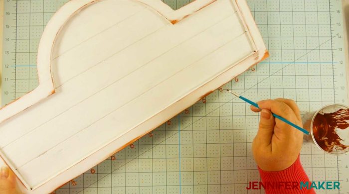 Painting the eyescrews copper on the bottom of a white board to make a family celebration and birthday board