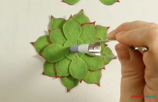 Press down again in the center of the felt succulent leaves