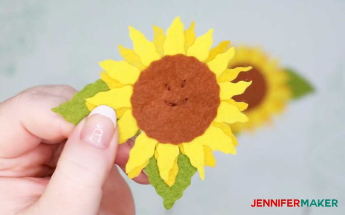 Felt sunflower with embroidered smiley face